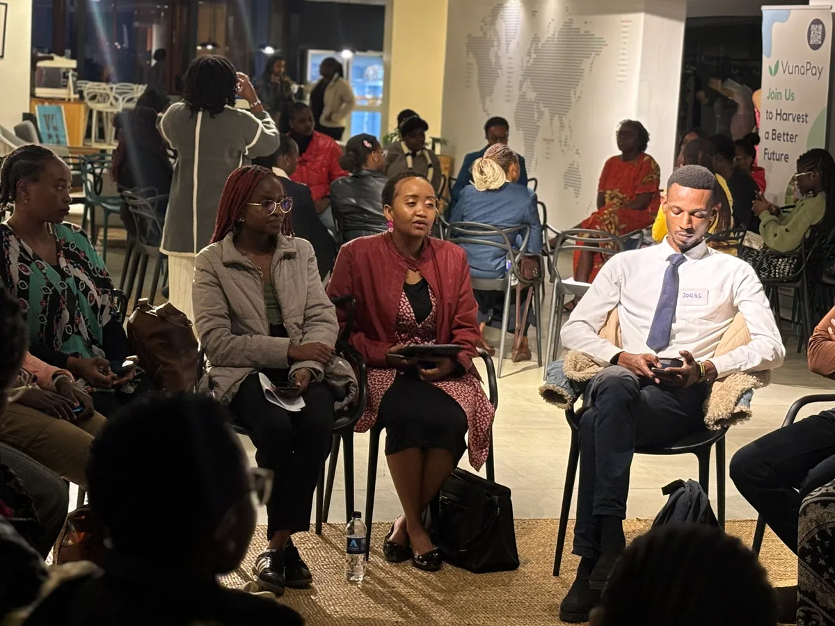 Participants following the conversation as the evening continues