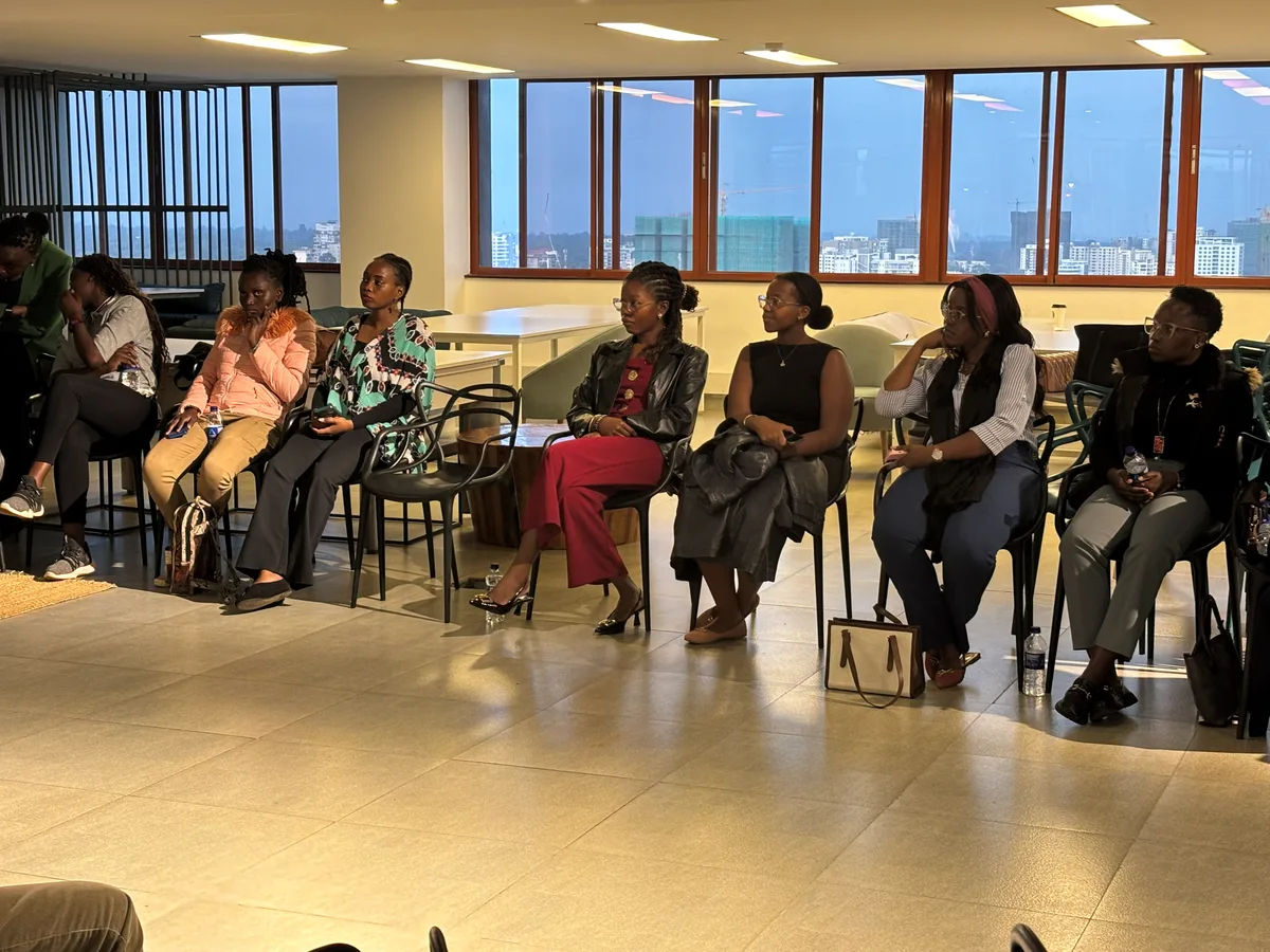 Participants seated together listening during a discussion